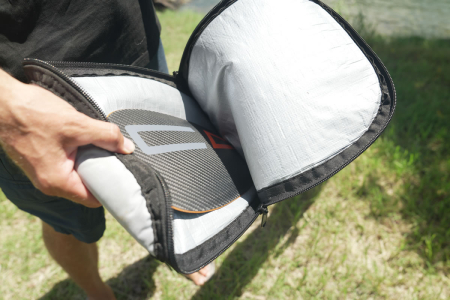 Code Foils Paddle Cover showing top unzipped with paddle inside